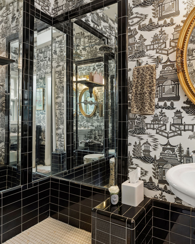 Marti Napolitano Interiors bathroom project photo featuring wall decor and glass mirrors.